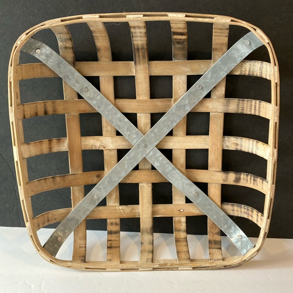 Preowned square split wood basket.